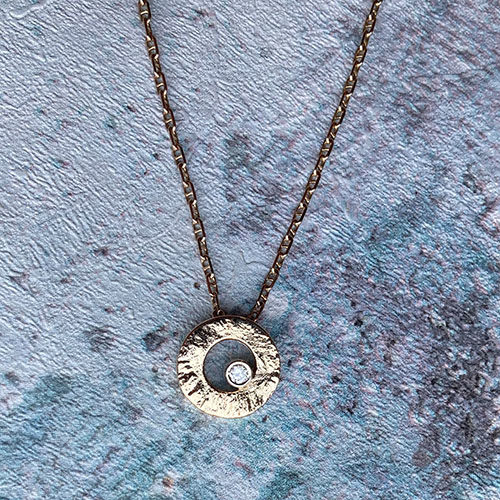 Yellow gold open disc pendant