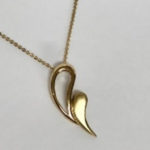 Yellow gold handmade pendant with open teardrop