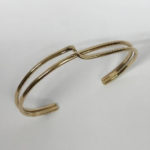 yellow gold torque style bangle