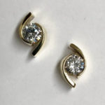 hand made gold and diamond stud earrings