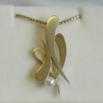 original design gold tear pendant
