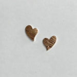 9ct rose gold heart shape stud earrings with a scratched finish