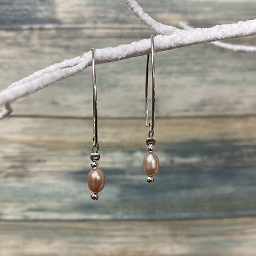 Long sterling silver and pale pink pearl earrings