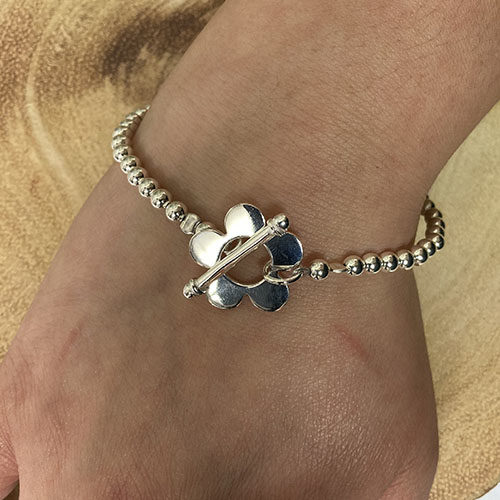 Sterling Silver Bead Bracelet with silver flower T-bar