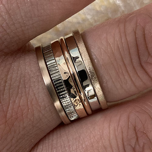 Yellow gold white gold and rose gold stacking rings