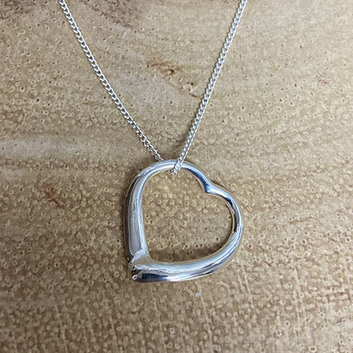 Sterling silver open heart pendant on a silver chain