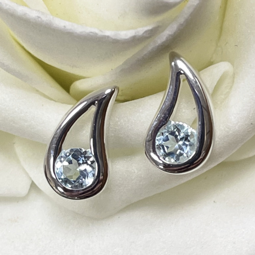 Sterling silver earrings with blue topaz