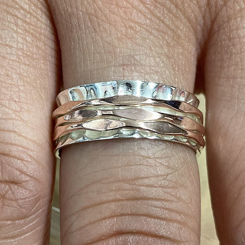 Sterling silver and rose gold spinning ring