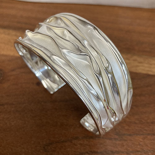 Sterling silver bangle with satin ruched effect