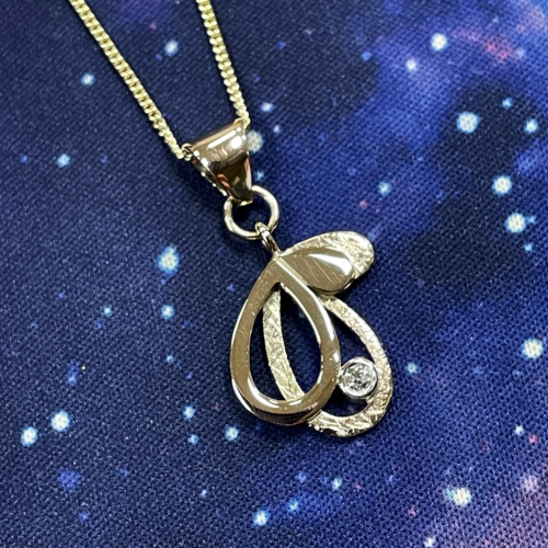 Yellow gold and diamond pendant