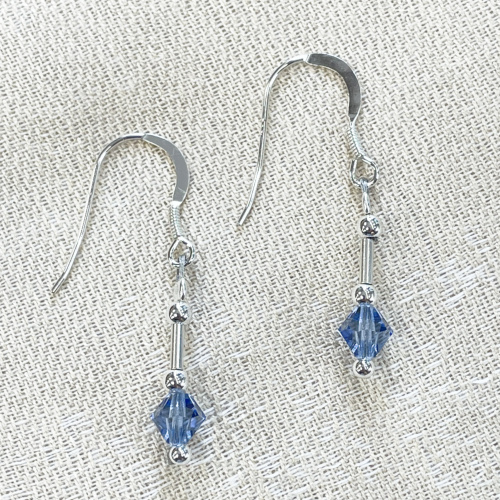 Sterling silver drop earrings with blue crystal