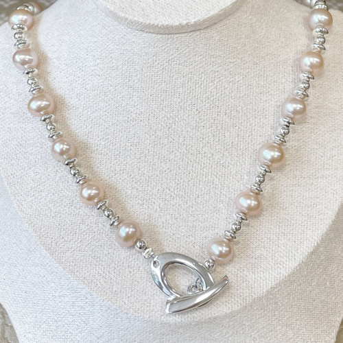 Silver and pale peach pearl necklace