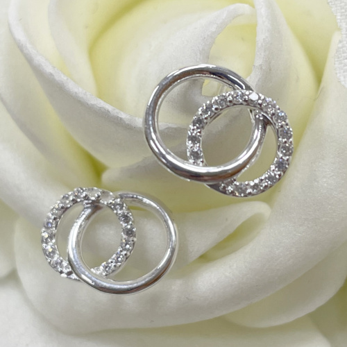 Silver circular cubic zirconia stud earrings