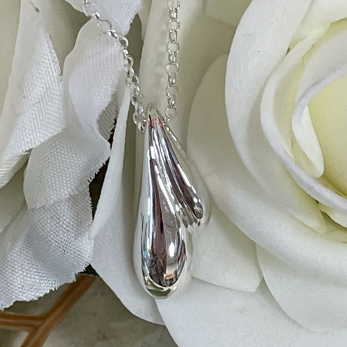 Sterling silver organic wave droplet pendant