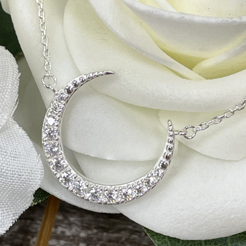 Silver and cubic zirconia crescent moon pendant