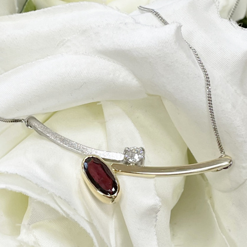 Gold Diamond and Garnet pendant