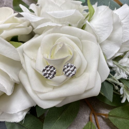 Sterling silver hammered effect disc earrings.