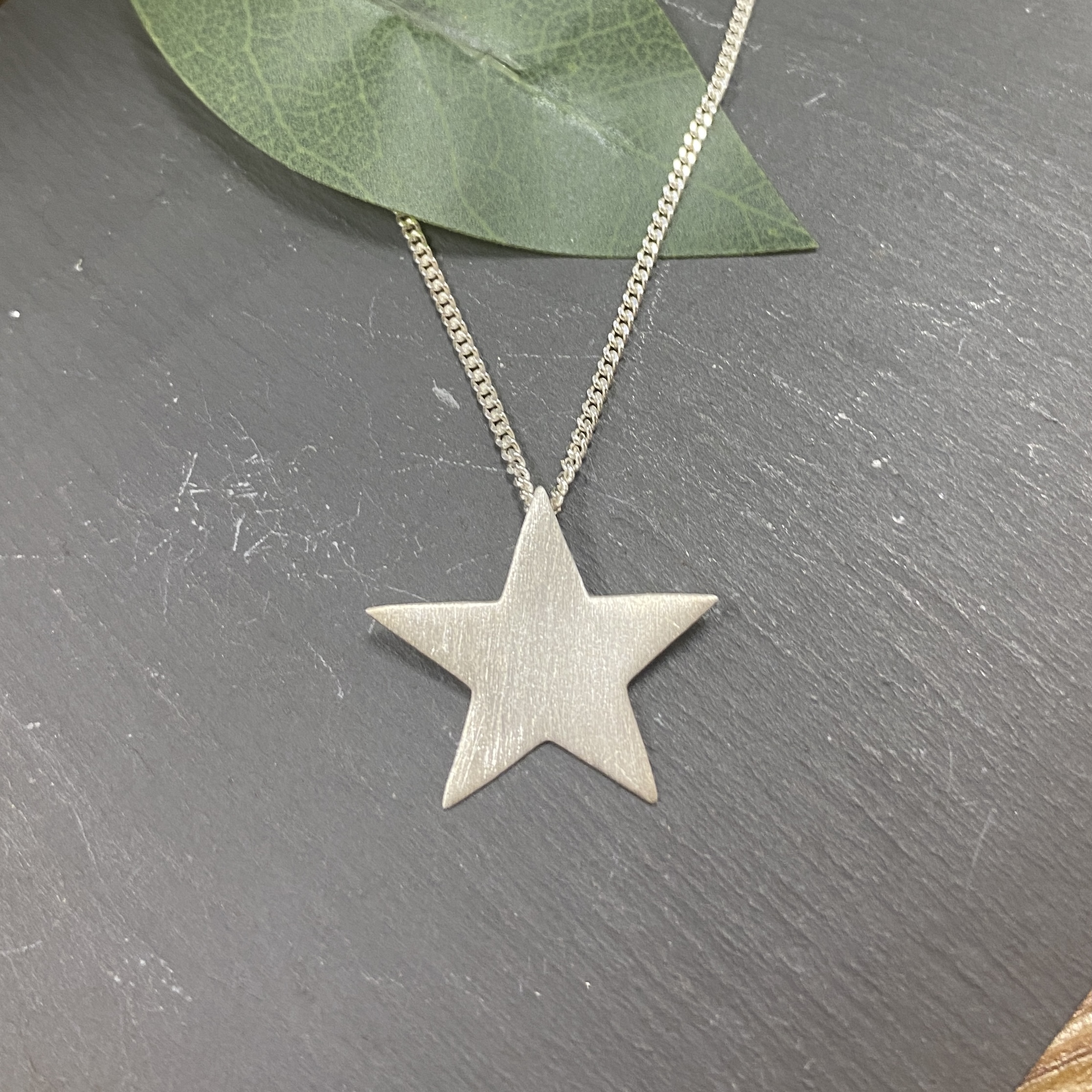 Sterling Silver scratched effect star pendant