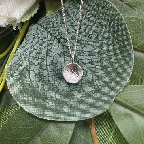 Sterling Silver bowl shaped pendant.